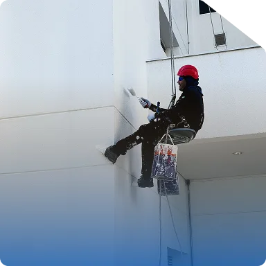 Torre residencial com tela de proteção Latitud durante a pintura da fachada
